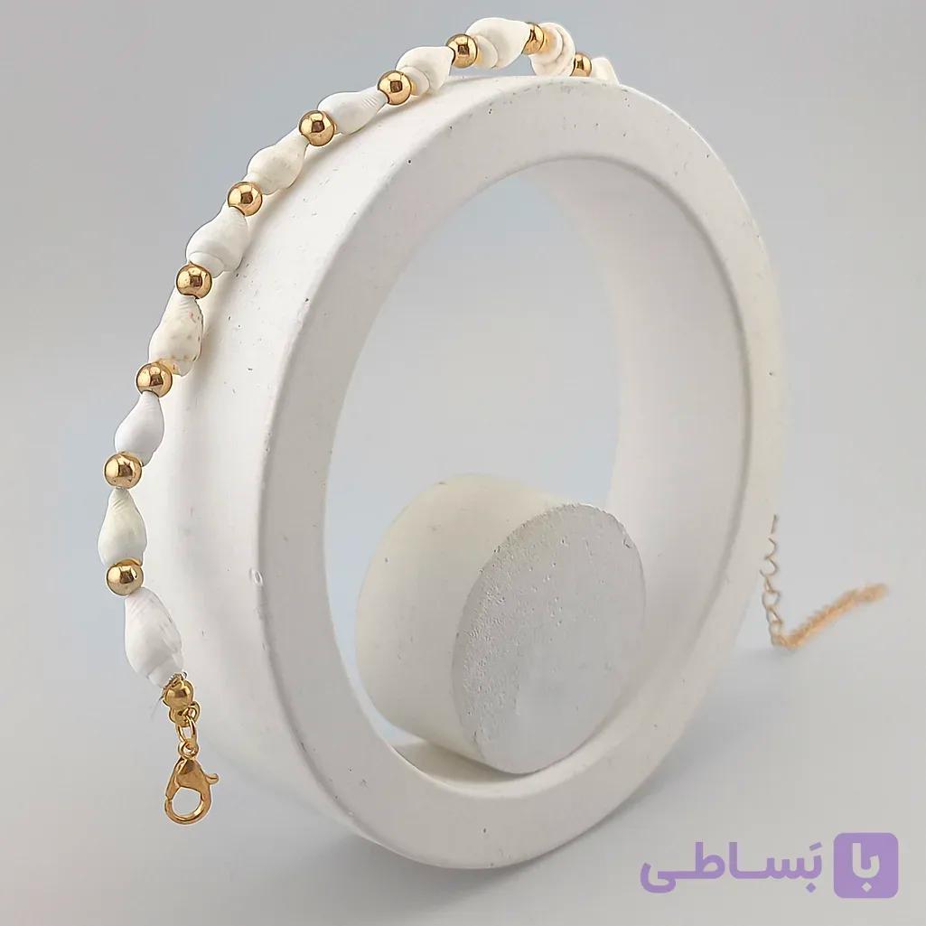 پابند ساحلی صدف و گوی طلایی — تصویر 1