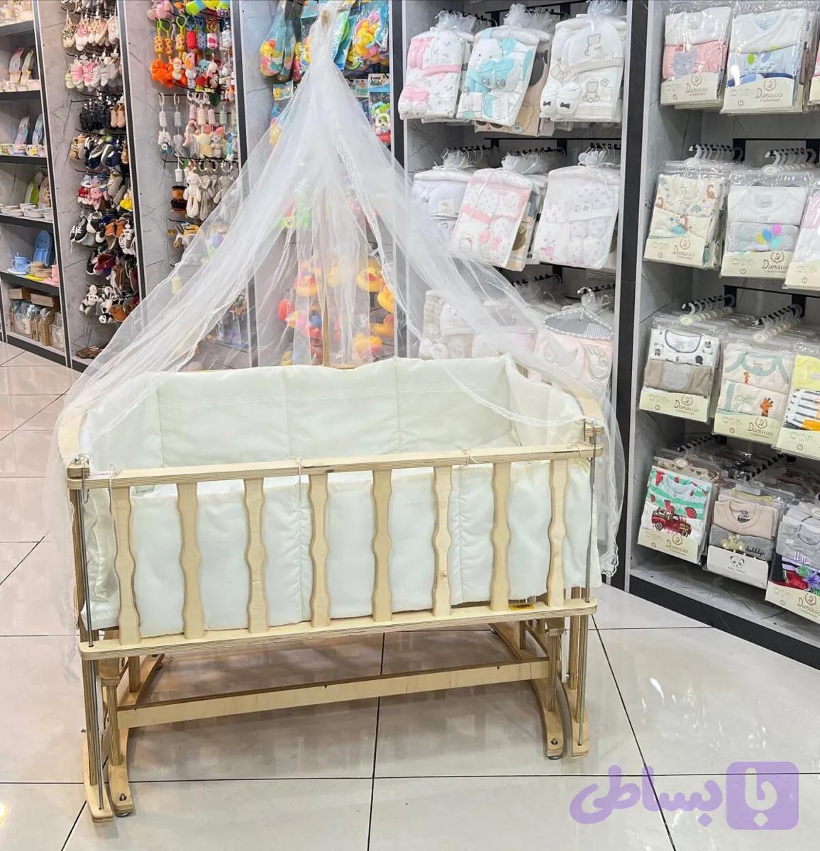 تخت و گهواره کنار مادر چوبی دانینی (تاشو و طرح ترک) — تصویر 1