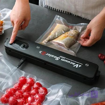 دستگاه پلمپ وکیوم خانگی کیسه فریزر vacuum sealer — تصویر 1