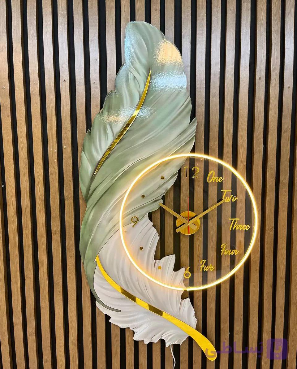 ساعت دیواری طرح پر سبز — تصویر 1