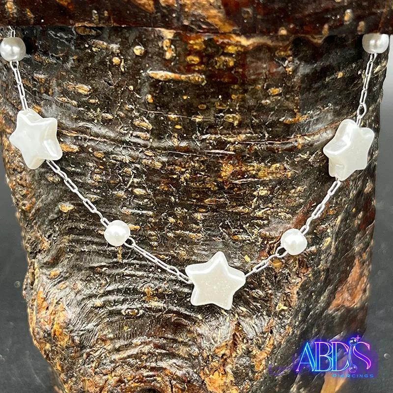 دستبند ستاره ای استیل ضد حساسیت رنگ ثابت با مهره و آویز ستاره🌟 — تصویر 1
