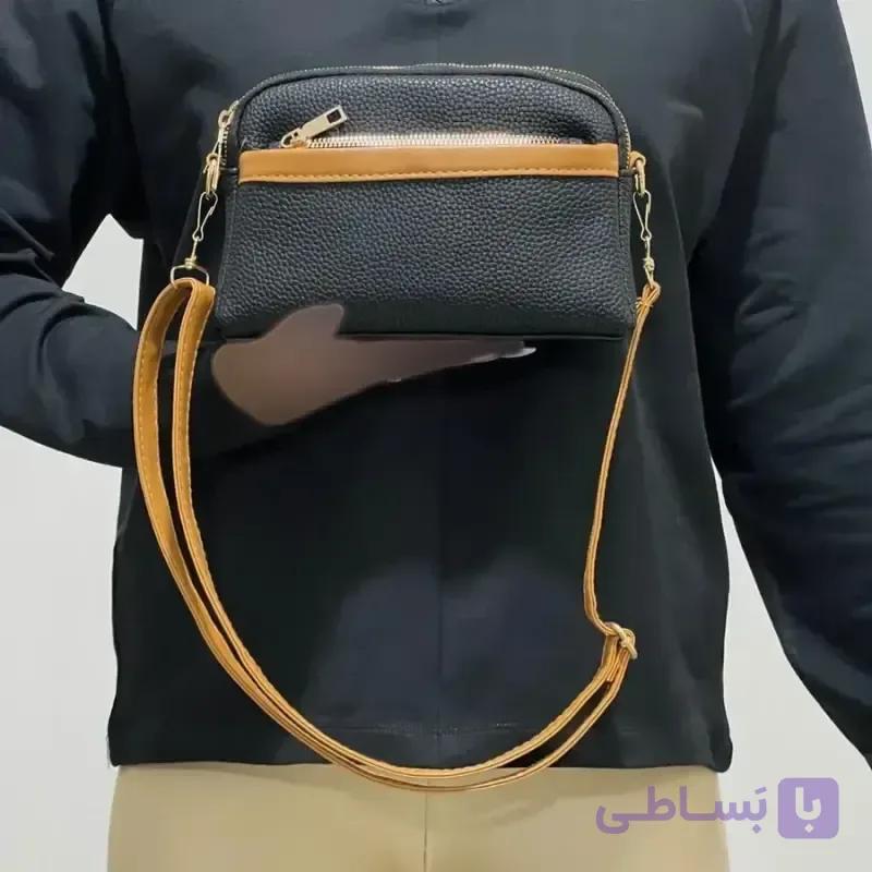 کیف دستی و دوشی پاسپورتی زنانه چرم مصنوعی با 4 زیپ و بند مچی و بلند کد 1389 — تصویر 1