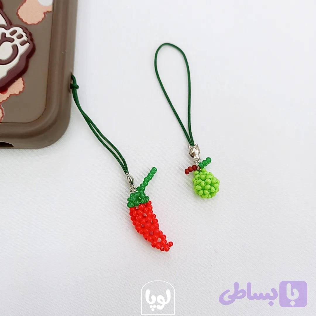 آویز موبایل منجوقی گلابی و فلفل