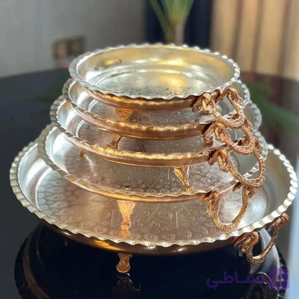 سینی و دیس گرد مسی پایه دار طرحدار گوشواره ای.سایز 4 قطر 34 سانت(یک عددی)
