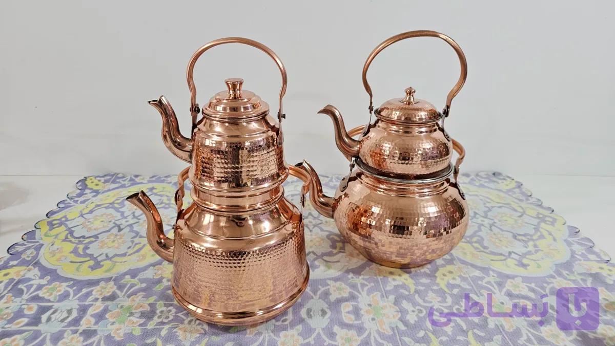 کتری مسی و قوری مسی دسته برنجی .کتری 2 لیتری داخل قلع ارتفاع کتری 17.ارتفاع قوری 13 سانت.در مس زنجان نمونه