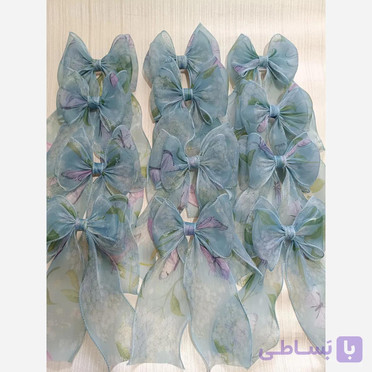 گیره مو طرح پاپیون قلبی رنگ آبی