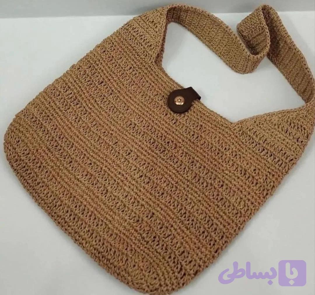 این مدل کیف رافیا محشره سایز بزرک بند راحت دکمه دار خیلی کیوته هم جا دار هم رنگ زیبا