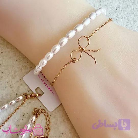 دستبند زنانه ژوپینگ دولاین مدل پاپیون و مروارید کد 4991
