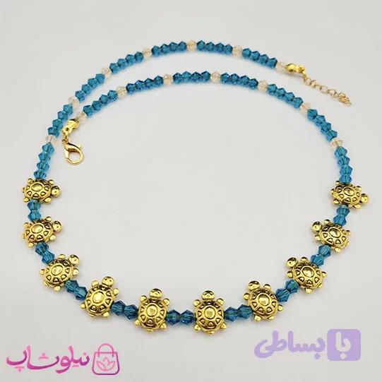 گردنبند زنانه دستساز برند N&SH مدل لاک پشتهای طلایی با کریستال سبزآبی کد 150 — تصویر 1