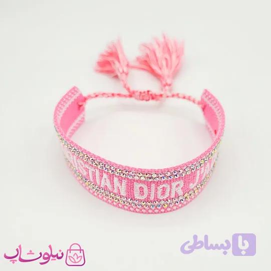 دستبند دخترانه پارچه ای کریستین دیور نگیندار صورتی سفید کد 145 — تصویر 1