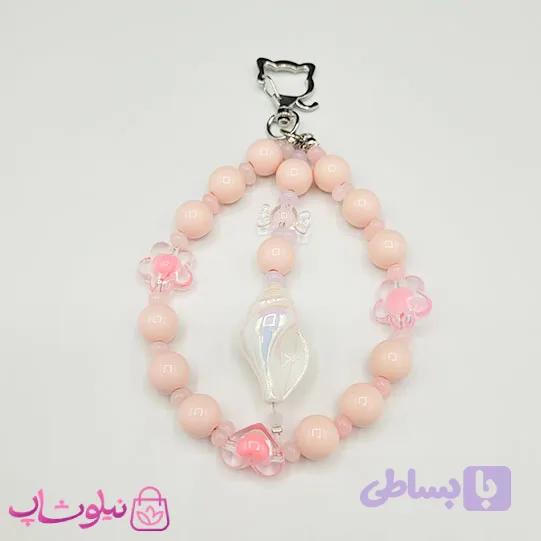 آویز کیف، گوشی، جاکلیدی دستساز برند N&SH رنگ صورتی با آویز صدف دریایی کد 190