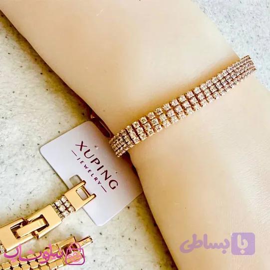 دستبند زنانه ژوپینگ طرح تنیسی طلایی سفید سه لاین کد 6491