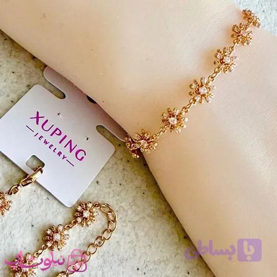 دستبند زنانه ژوپینگ مدل گلهای طلایی نگین سفید کد 6991