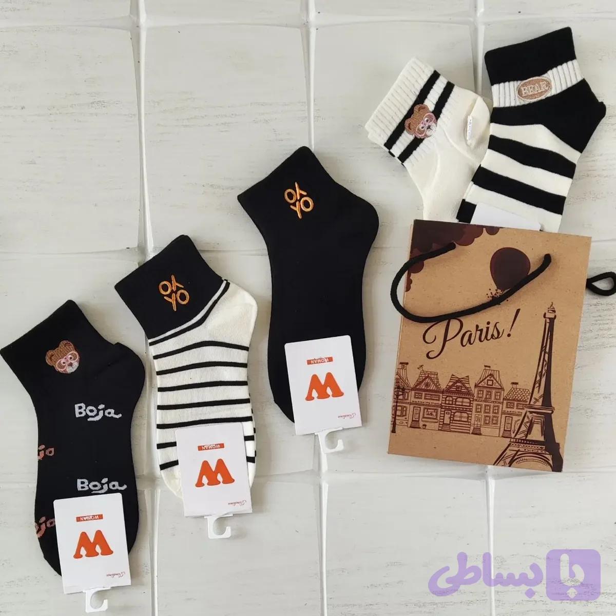 جوراب وارداتی WOMAN سفید مشکی — تصویر 1