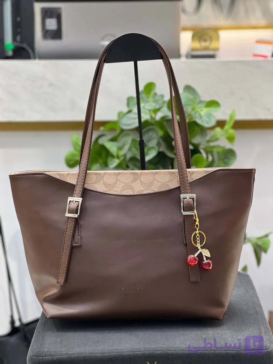کیف دوشی و دستی زنانه سایز بزرگ coach با آویز آلبالو