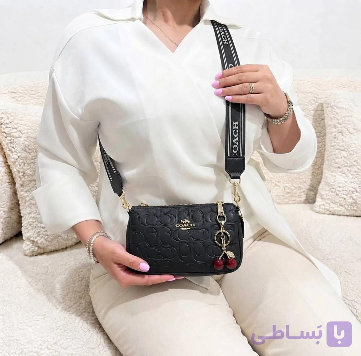 کیف دوشی زنانه مارک coach به همراه بند پهن و گیلاس
