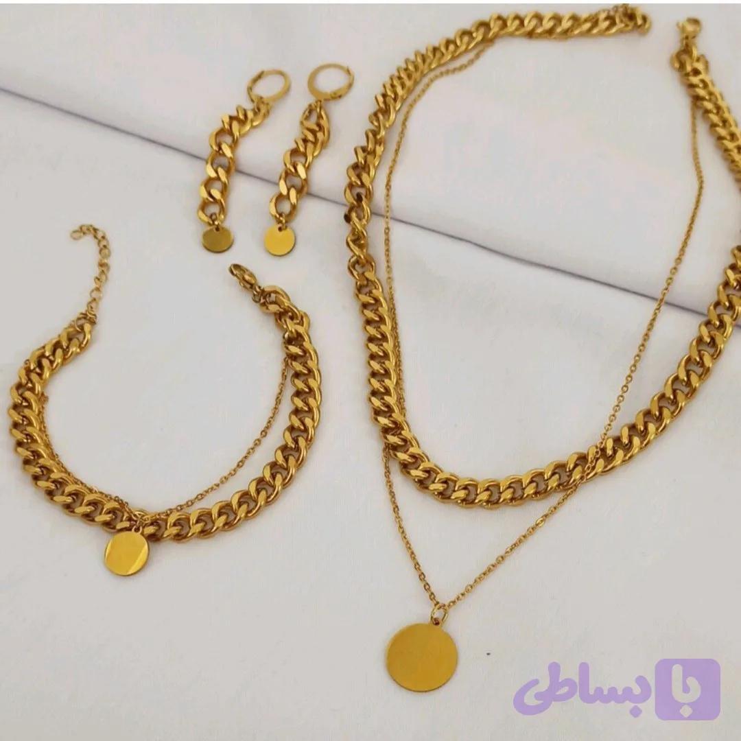 ست کارتیر استیل رنگ ثابت سکه ای گردنبند گوشواره دستبند — تصویر 1