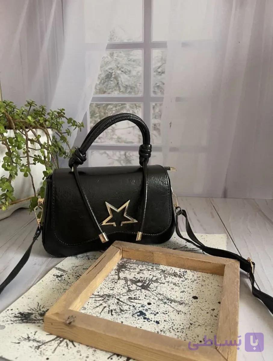 کیف زنانه پاسپورتی ستاره‌ای مدل بند طنابی چرم صنعتی مشکی