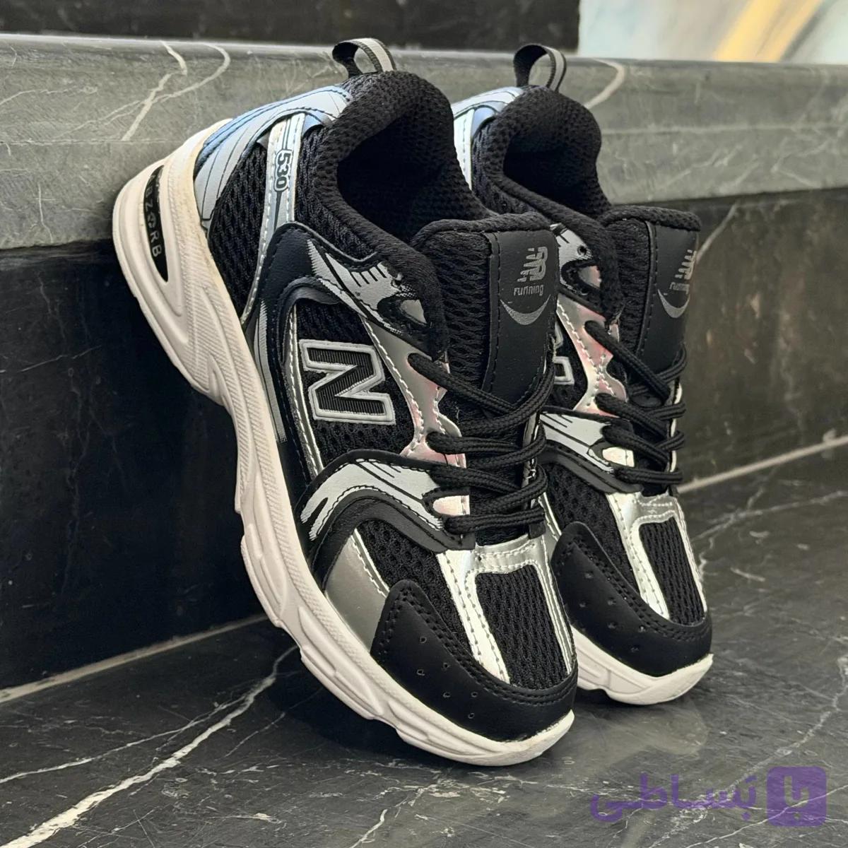 کفش کتانی نیوبالانس 530 بچگانه مشکی زیره سفید NEW BALANCE 530 — تصویر 1