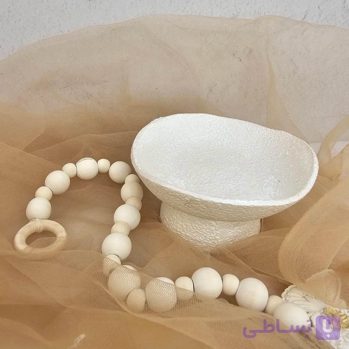 کاسه سنگی دفرمه پایه دار — تصویر 1