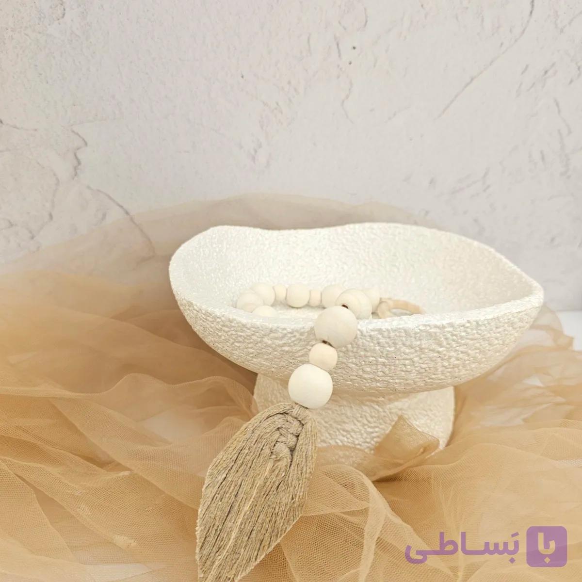 دیس سنگی دفرمه پایه دار — تصویر 1