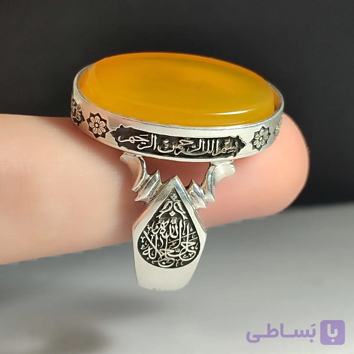 انگشتر نقره باسنگ شرف الشمس ذکر رکاب(سوره توحید) ذکر بغل رکاب (الله جل جلاله) و (محمد رسول الله) کد 2338 — تصویر 1