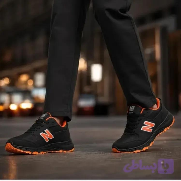 کتانی نیوبالانس مردانه مدل nino مشکی نارنجی