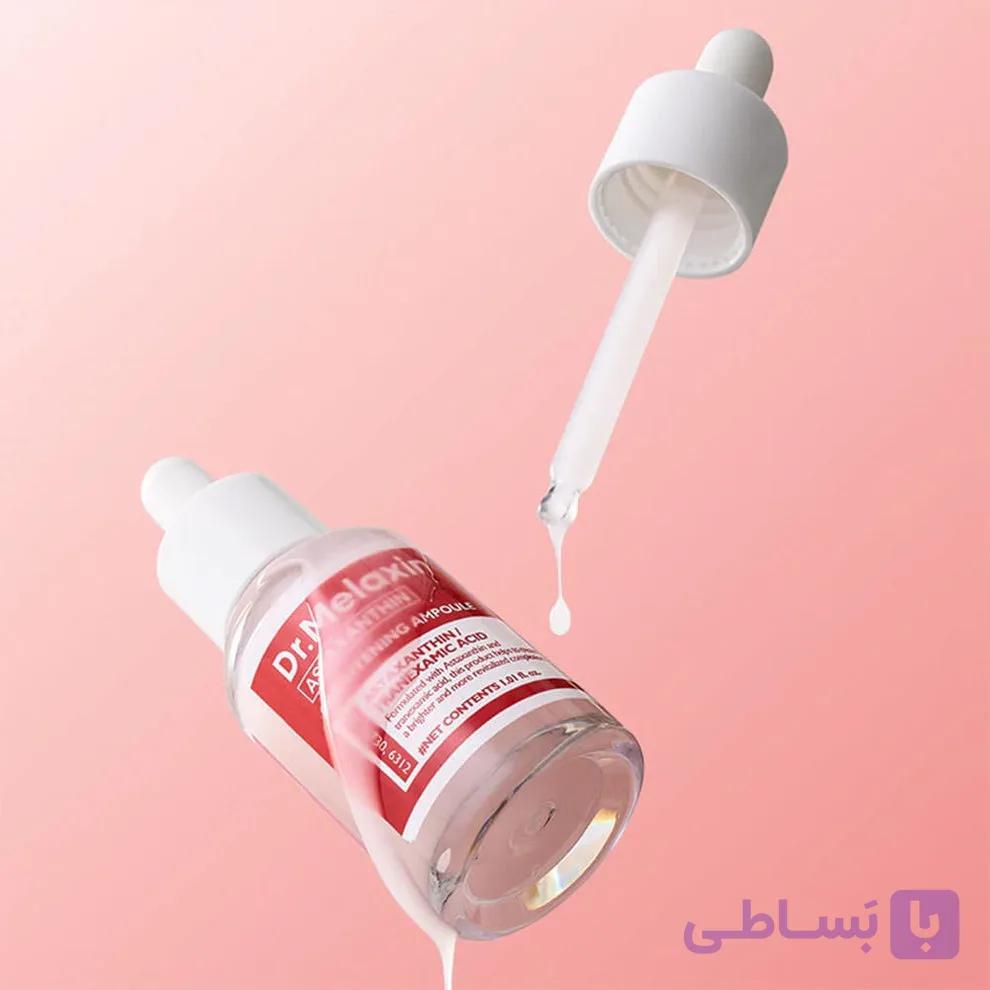آمپول آستاگزانتین دکتر ملاکسین برطرف کننده کک مک و ضد لک و روشن کننده  Dr.Melaxin Astaxanthin Brightening Ampoull