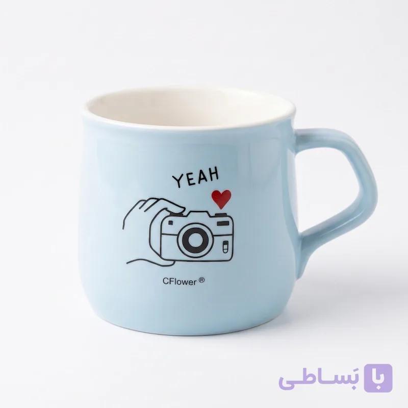 ماگ سرامیکی مینیمال دردار با قاشق طلایی طرح برگ — تصویر 1