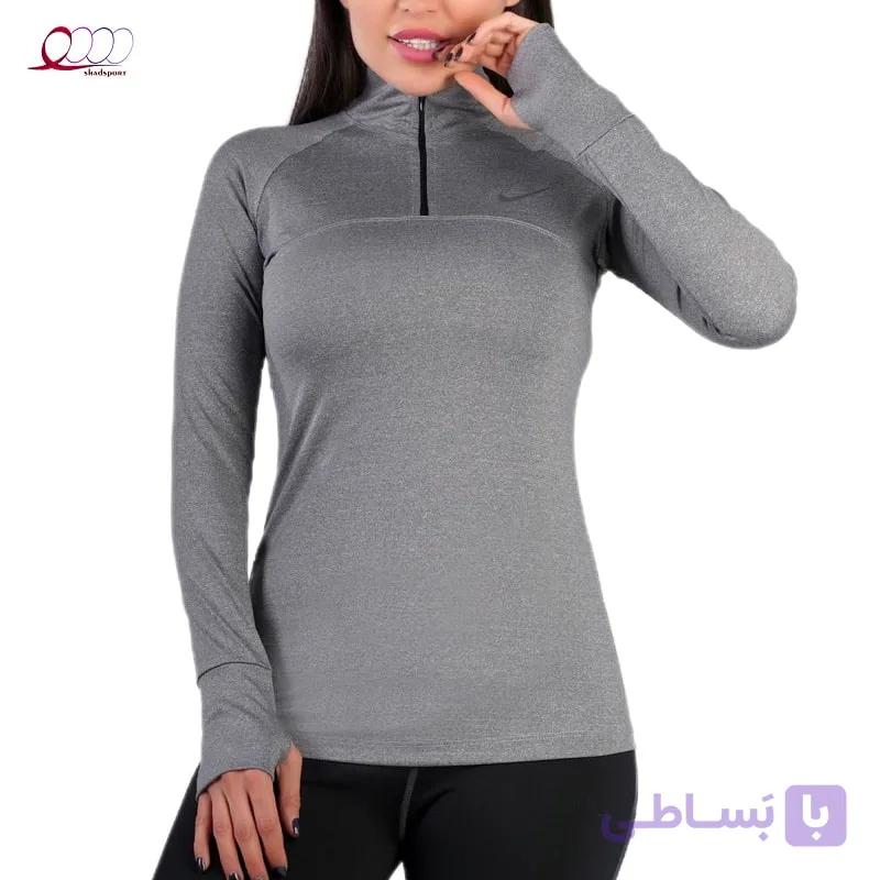 بلوز ورزشی زنانه نیم زیپ فینگردار نایک — تصویر 1