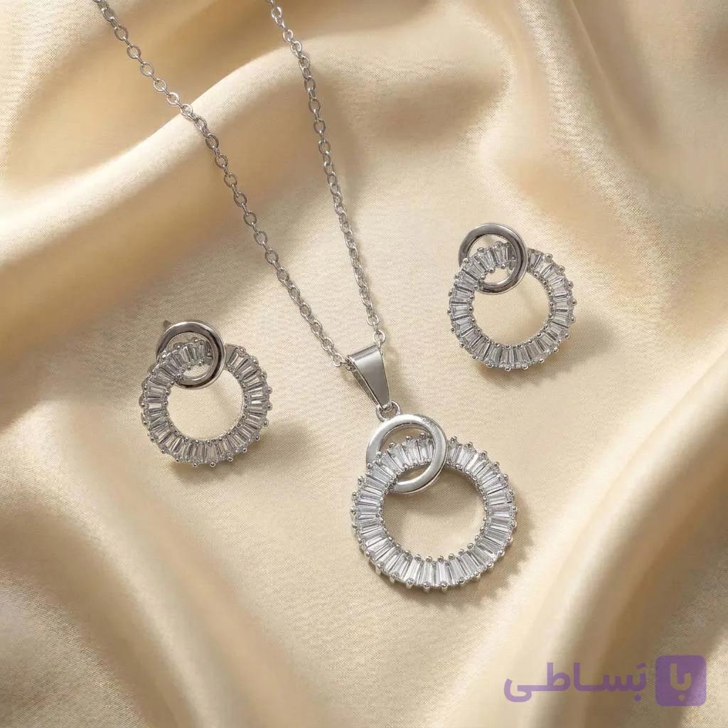 نیم ست نقره‌ای طرح دو حلقه متصل با نگین باگت — تصویر 1