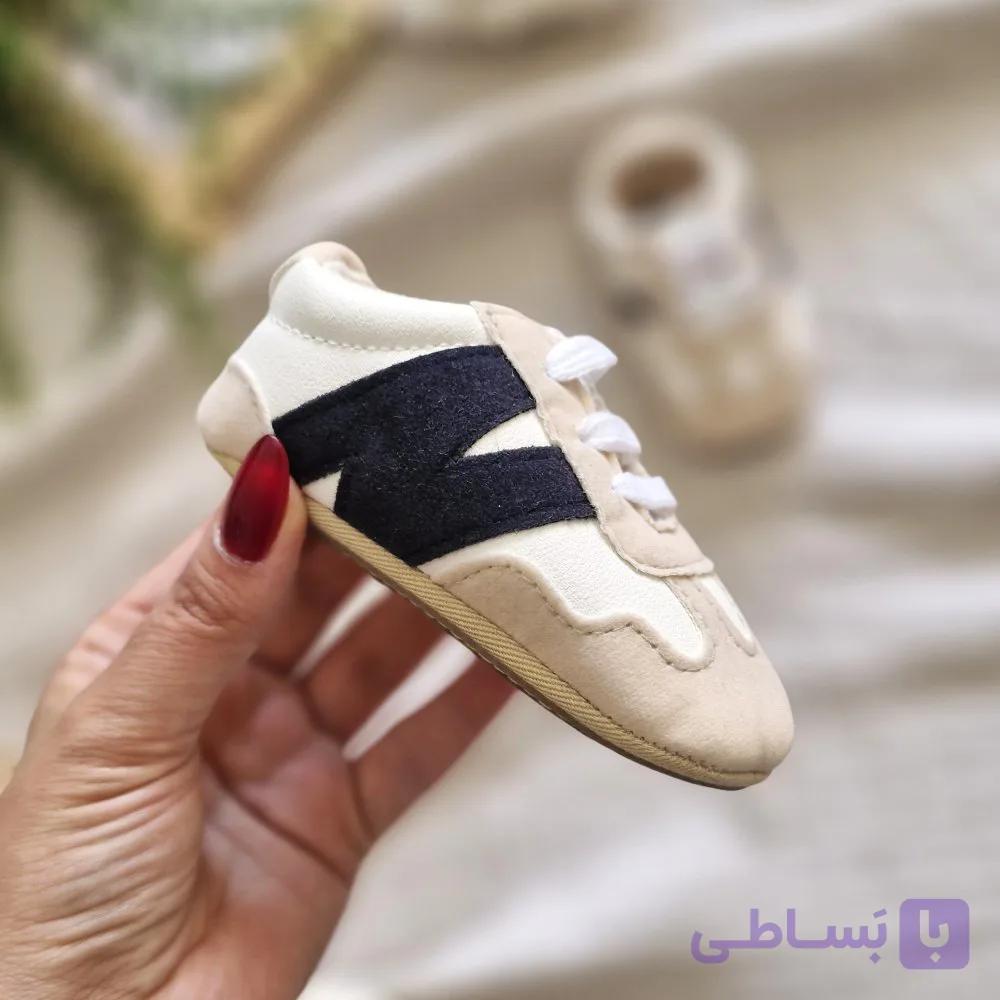 پاپوش نوزادی اسپرت نیوبلنس New Balance وارداتی کرم مشکی — تصویر 1