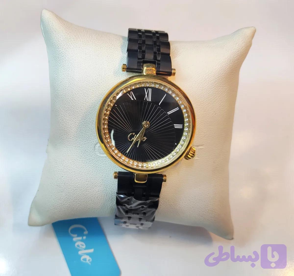 ساعت مچی زنانه CIELO سیلو فلزی کلاسیک ظریف بند مشکی قاب رزگلد صفحه مشکی دور صفحه نگین دار کد 1758