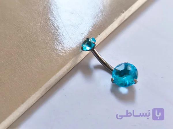 پیرسینگ ناف نقره ای با نگین فیروزه ای — تصویر 1