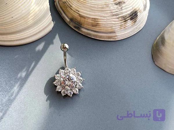پیرسینگ ناف طرح گل آفتاب گردان — تصویر 1