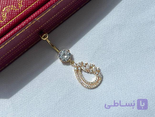 پیرسینگ ناف طرح لوزی نگین کاری شده — تصویر 1