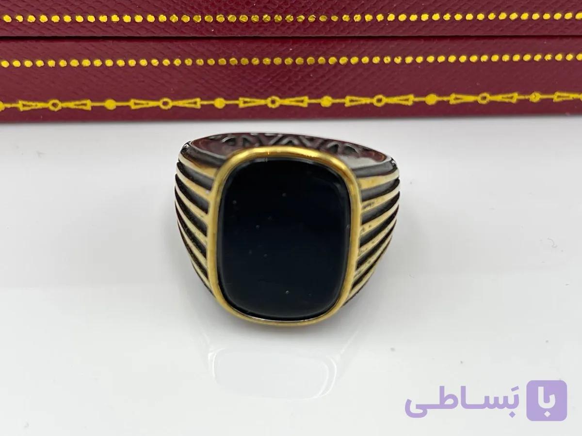 انگشتر سنگ مشکی نقره ای طلایی — تصویر 1
