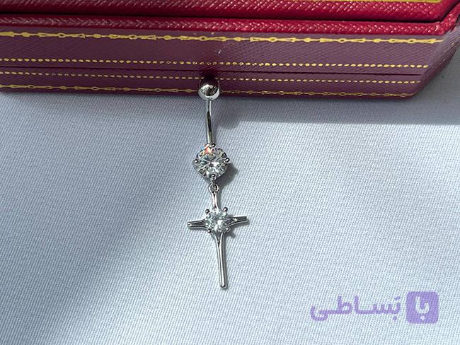پیرسینگ ناف نگینی طرح صلیب — تصویر 1