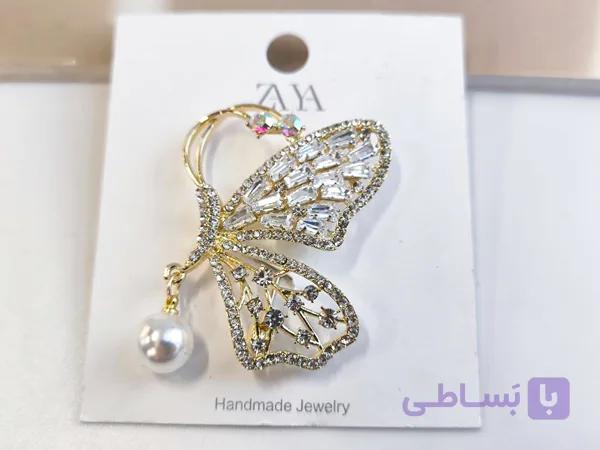 گل سینه پروانه ای آویز مرواریدی کد 10718 — تصویر 1