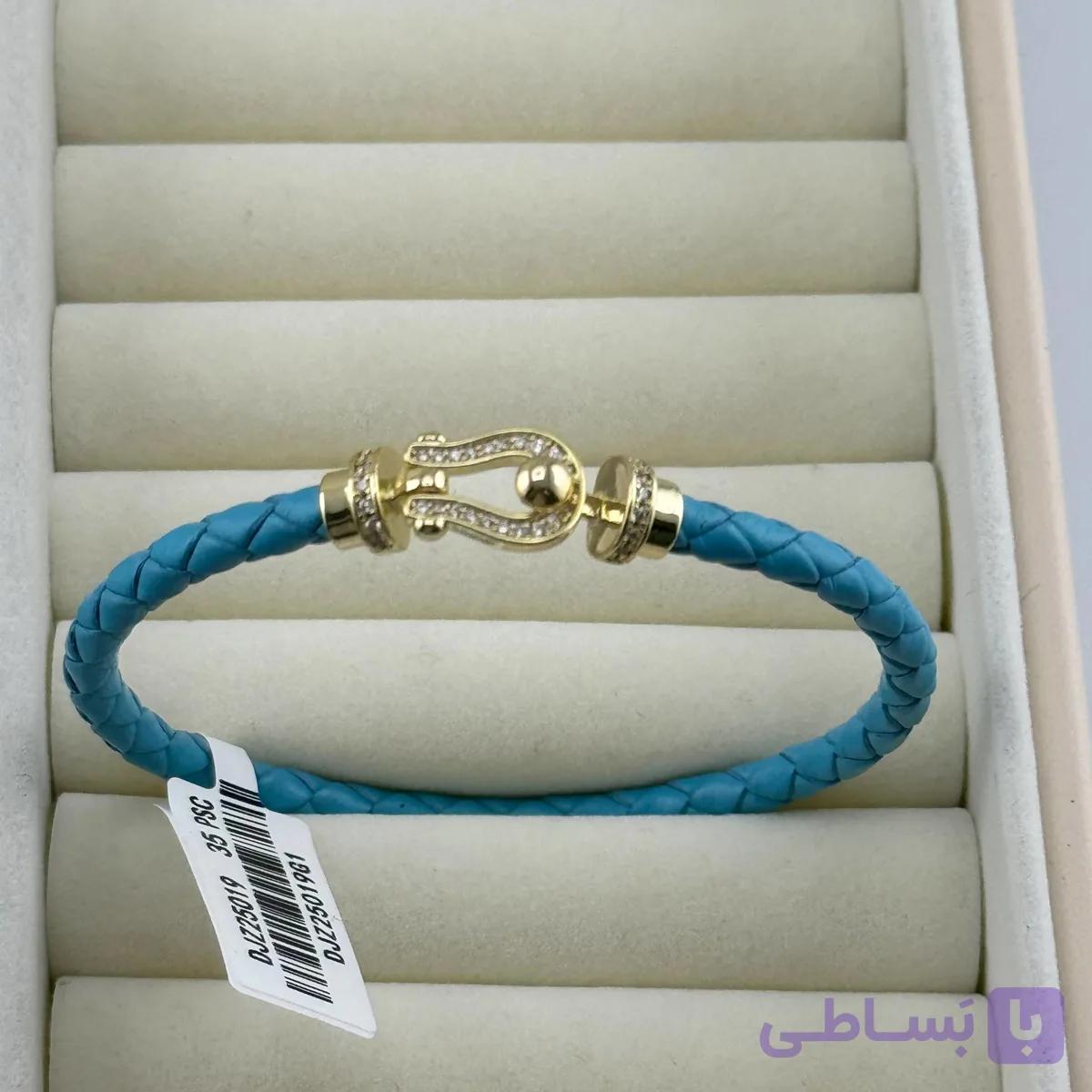 دستبند فرد آبی نگین دار طلایی — تصویر 1