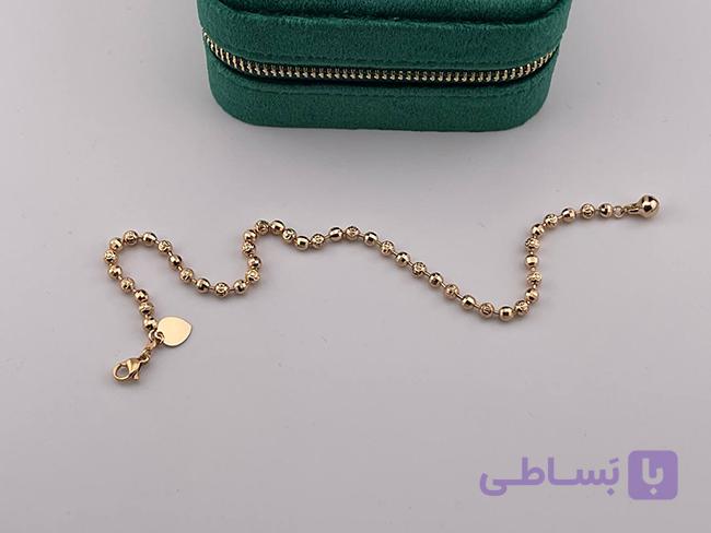 پابند زنانه طرح گوی طلایی و نقره ای — تصویر 1
