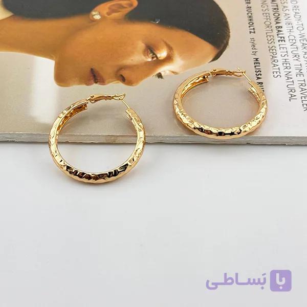 گوشواره ژوپینگ طلایی طرح برجسته تراش‌دار