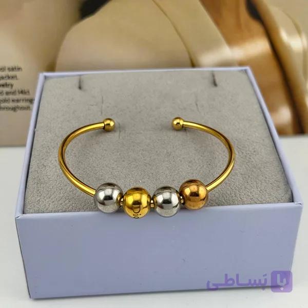 دستبند ژوپینگ چهار گوی طلایی و نقره‌ای — تصویر 1
