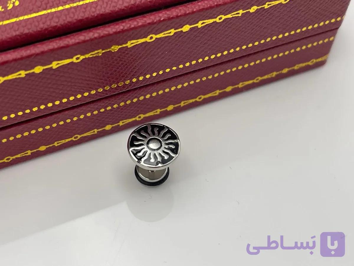 پیرسینگ گوش خورشید مشکی — تصویر 1