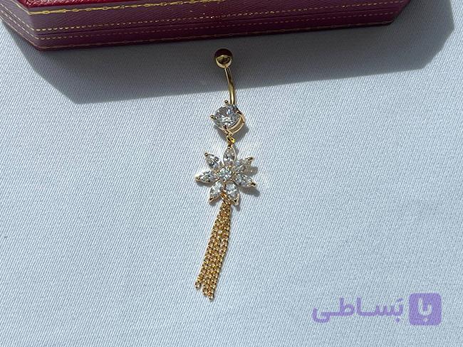 پیرسینگ ناف طرح تک نگین و گل — تصویر 1