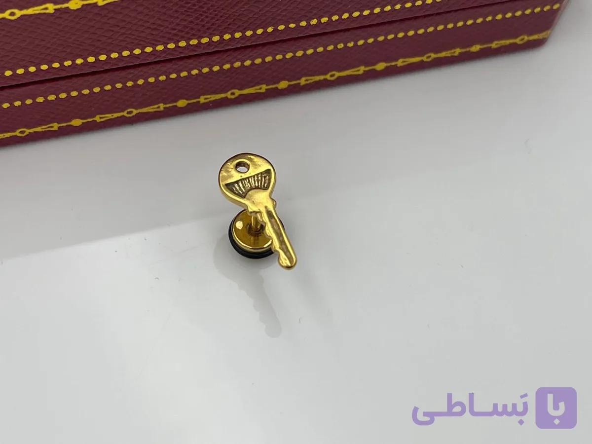 پیرسینگ گوش کلید طلایی — تصویر 1