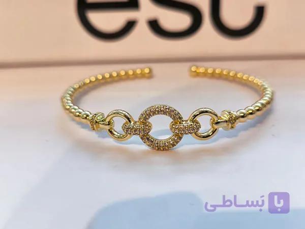دستبند بنگل نگینی امگا زنانه طلایی — تصویر 1