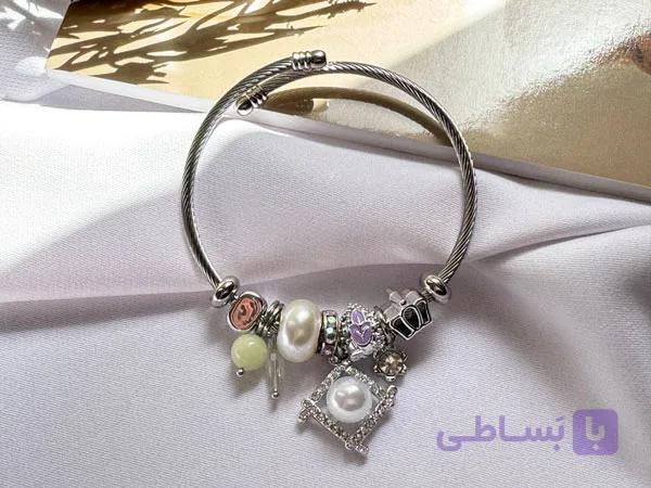 دستبند چارم مرواریدی استیل — تصویر 1
