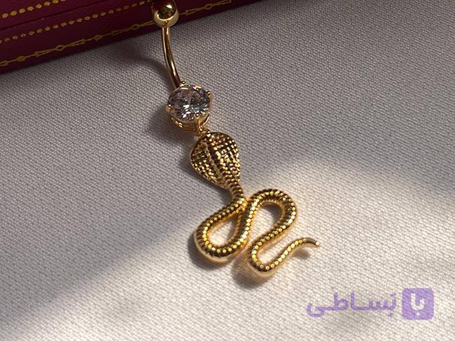 پیرسینگ ناف طرح مار کبری — تصویر 1