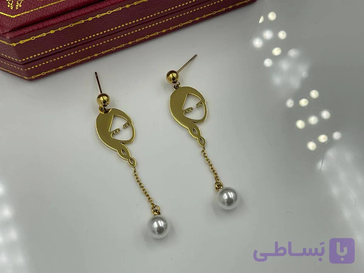 گوشواره طرح چهره با آویز مروارید — تصویر 1